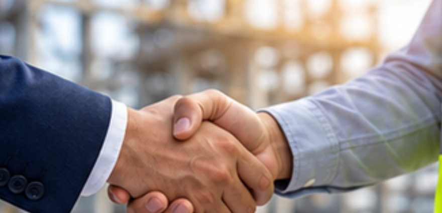 Handshake at a project site
